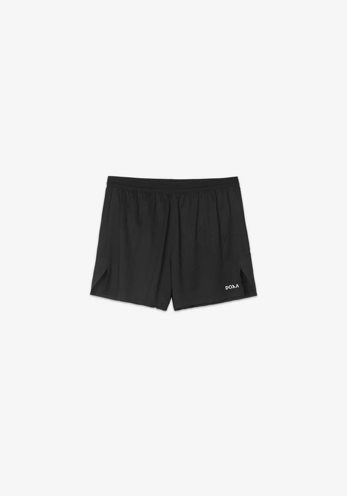 UNS RERUN SHORTS 4 in black with ventilated elastic waistband and reflective details for running.